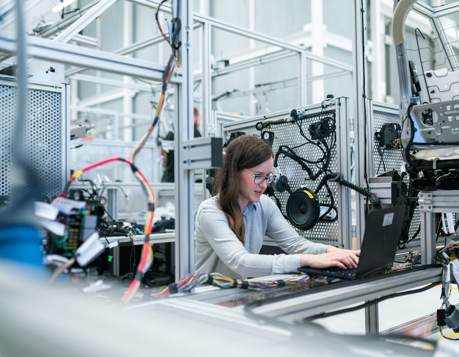 Production team operating commercial printing equipment